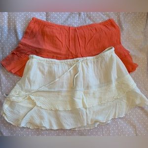 Two beach mini skirts, peach and off-white, size S